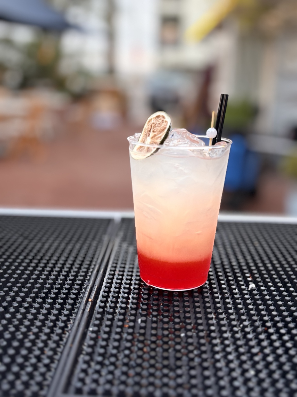 Layered pink and white specialty cocktail